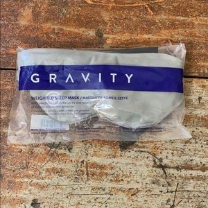 Gravity weighted sleep mask